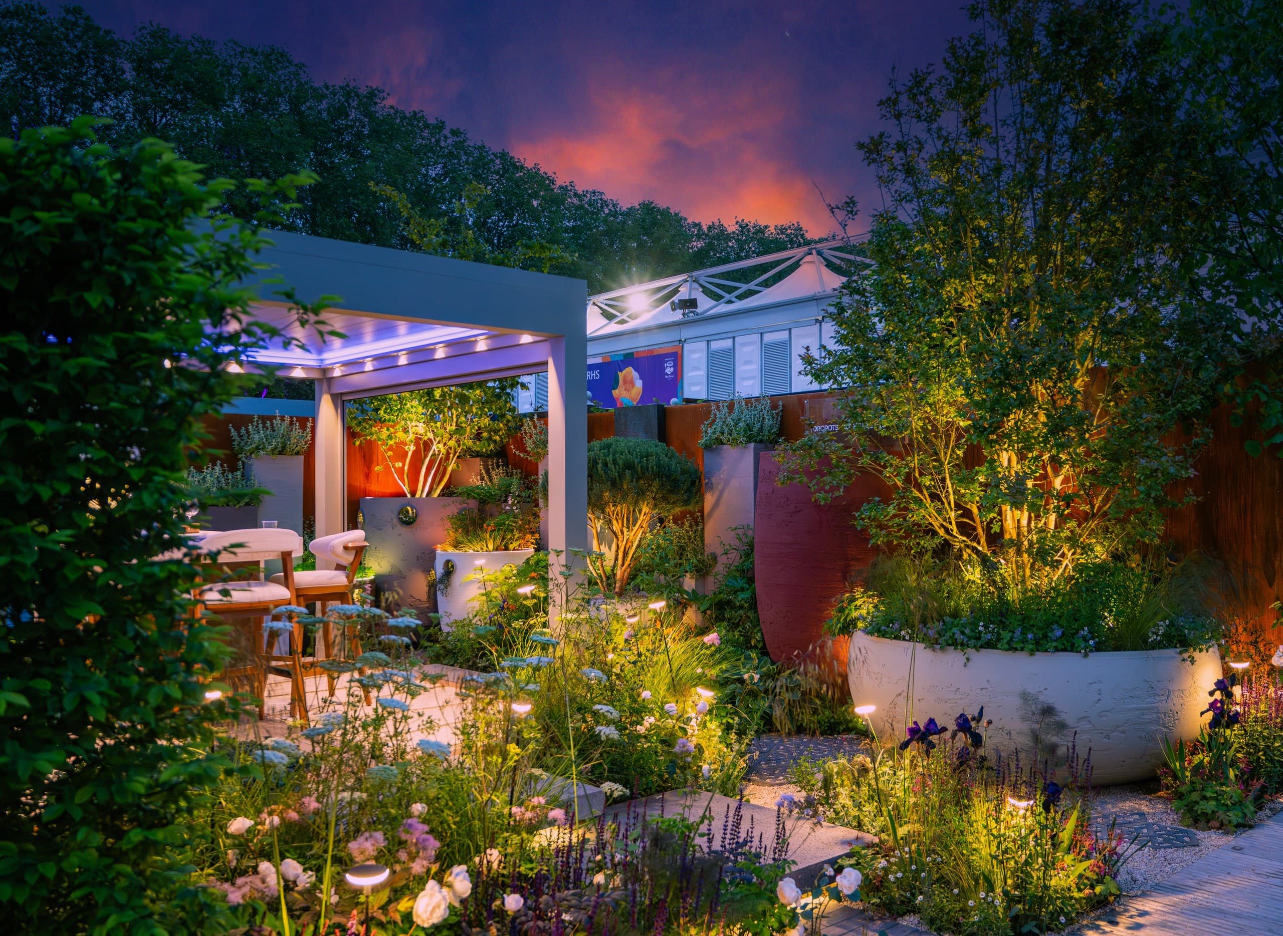 Ottorigo Bioclimatic Series pergola lit at evening